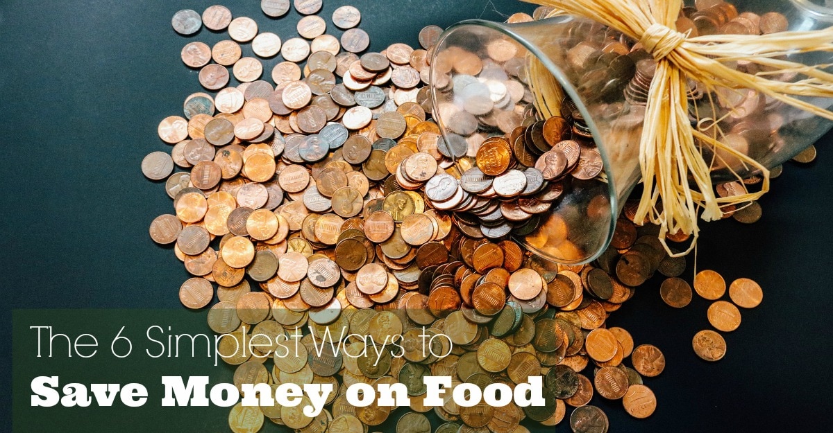 The 6 simplest ways to save money on food. Coins spilling out of the jar.