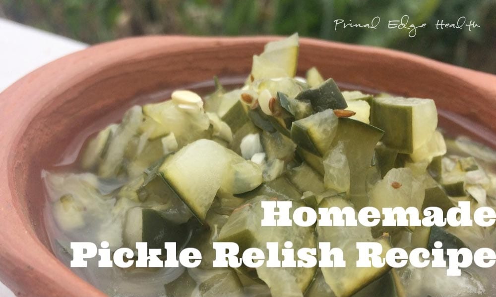 A serving of pickle relish in a brown bowl.