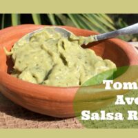 A serving of tomatillo avocado salsa in a brown bowl.