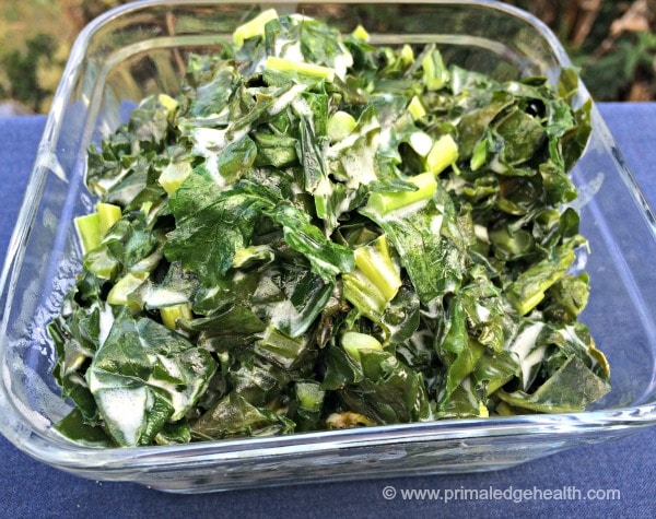 Creamed kale on a glass dish.