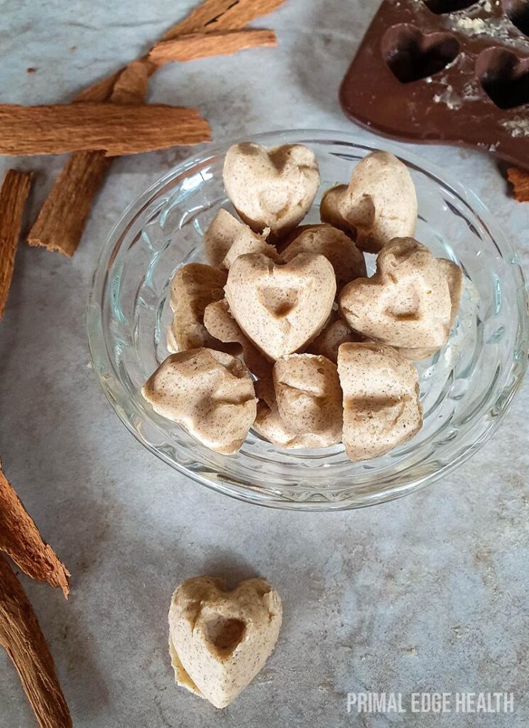 Several pieces of cinnamon fat bomb in a glass bowl.