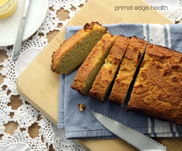 Low-carb coconut flour bread with half that is sliced into pieces.
