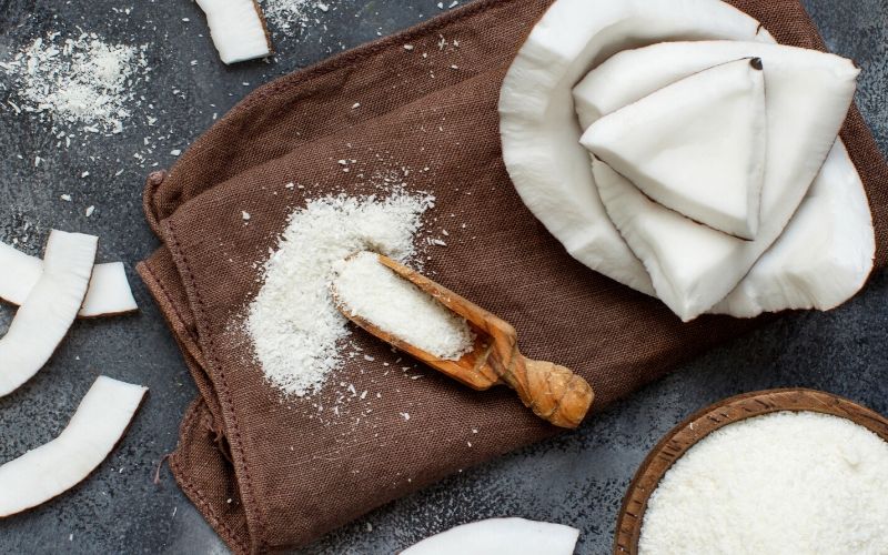Coconut flour on a brown cloth.
