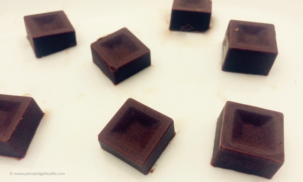 Keto chocolate maca pieces cut in squares.