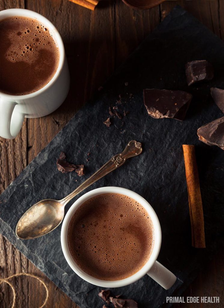 Two servings of keto hot chocolate in a white cup.