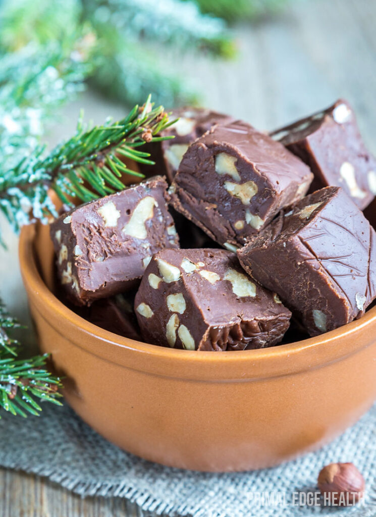 A brown bowl of keto nutella fat bombs.,