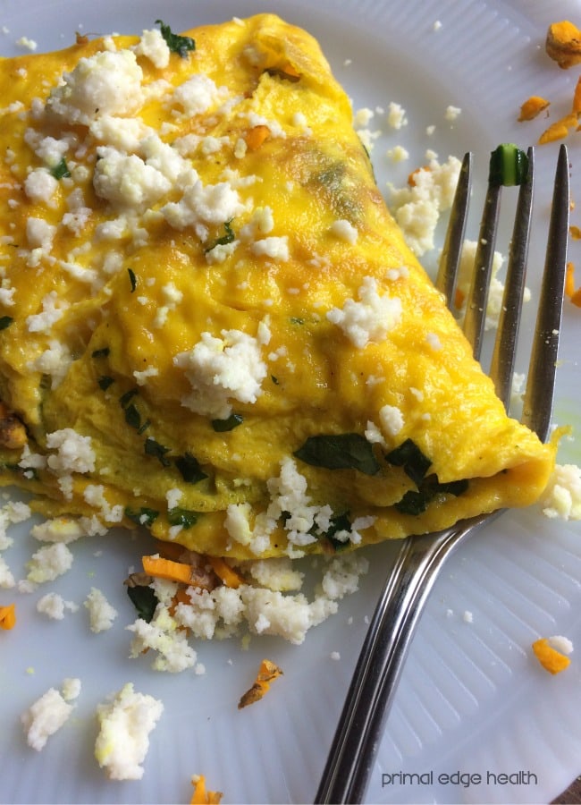 Turmeric omelette with spinach and goat cheese.