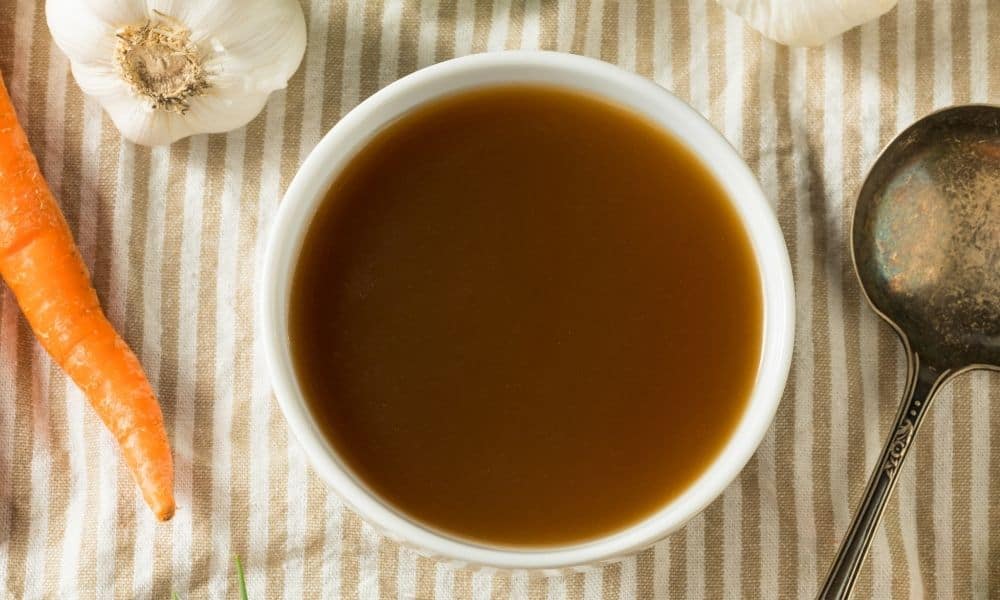 A single serving of slow cooker beef bone broth.