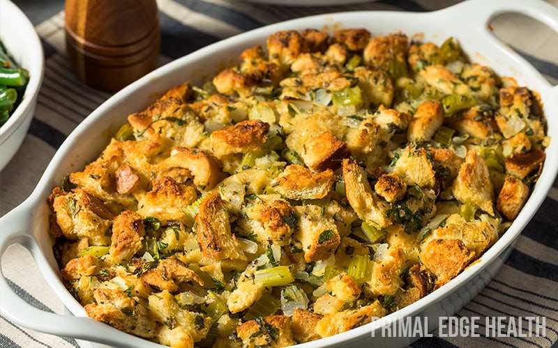 A dish of low carb stuffing recipe on top of a blue and white cloth.