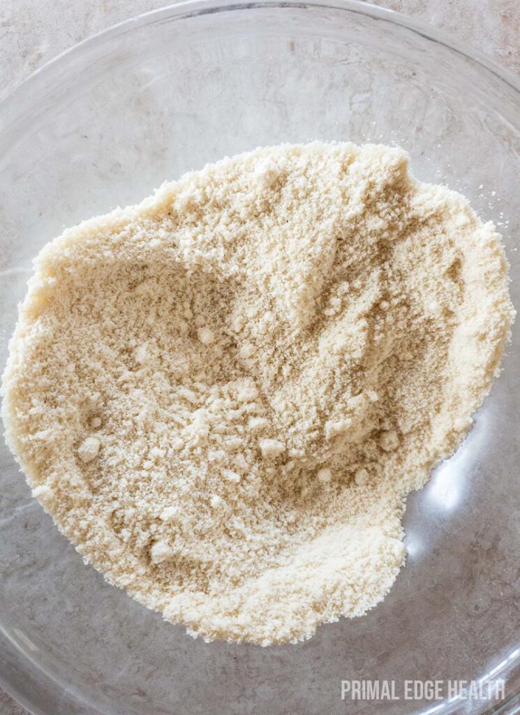 A bowl containing dry, uncombined ingredients.