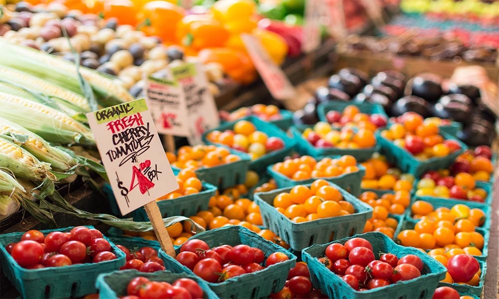 Fresh fruits and vegetables for sale in the market.