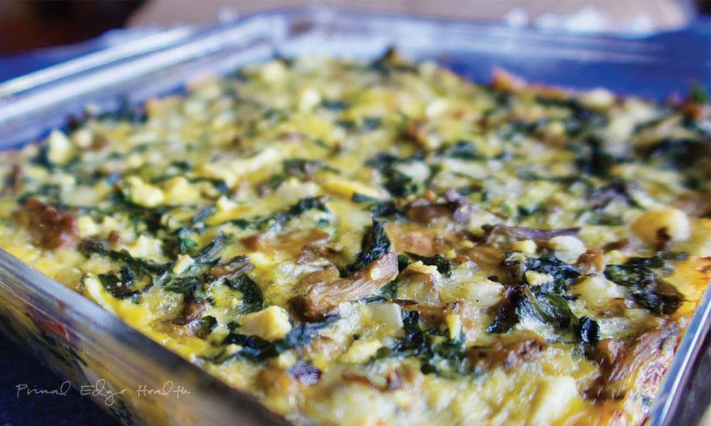 Cheesy keto casserole in a glass dish.