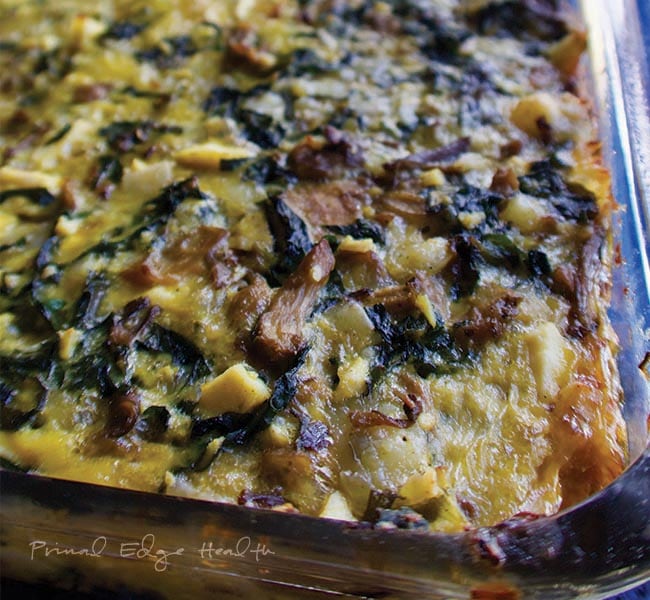 Cheesy keto casserole in a glass dish.