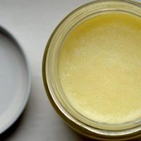 Simple tallow balm in a container without lid.