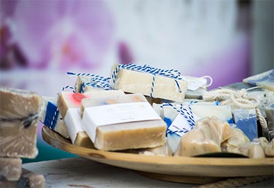 A bowl of cold process soap on top of a table.