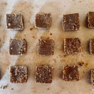 Easy homemade pemmican recipe squares on the table.