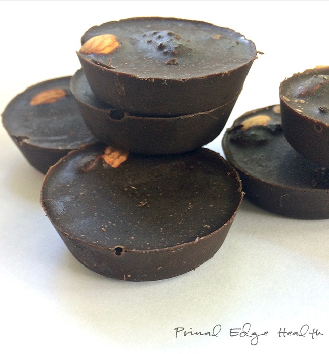 Sugar-free chocolate almond cups in a stack.