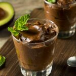 Two glasses of keto chocolate avocado pudding.