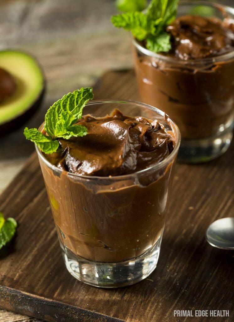 Two glasses of keto chocolate avocado pudding.