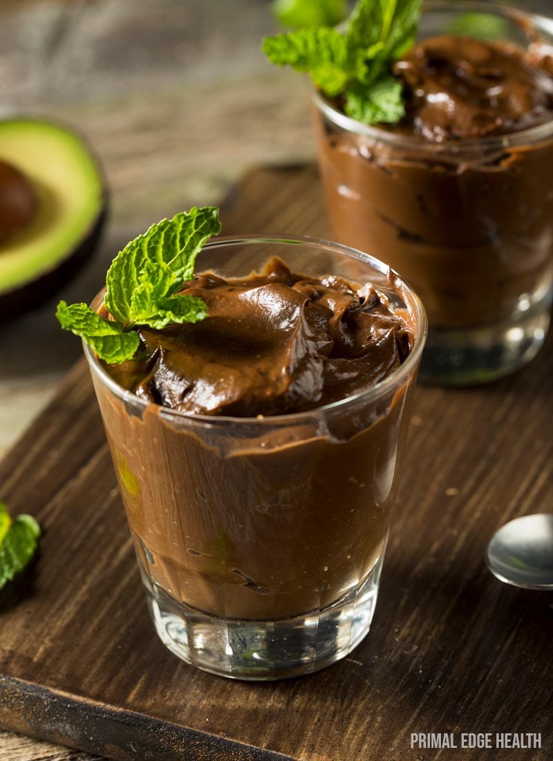 Two glasses of keto chocolate avocado pudding.