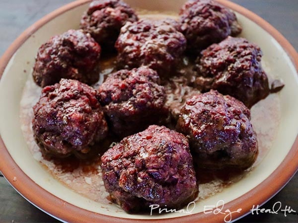 Easy beef heart meatballs on a plate.