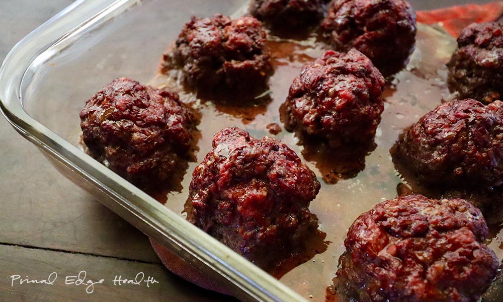 A glass dish with easy beef heart recipe.