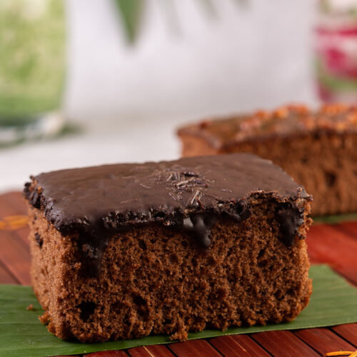 Easy keto chocolate cake on a brown surface.