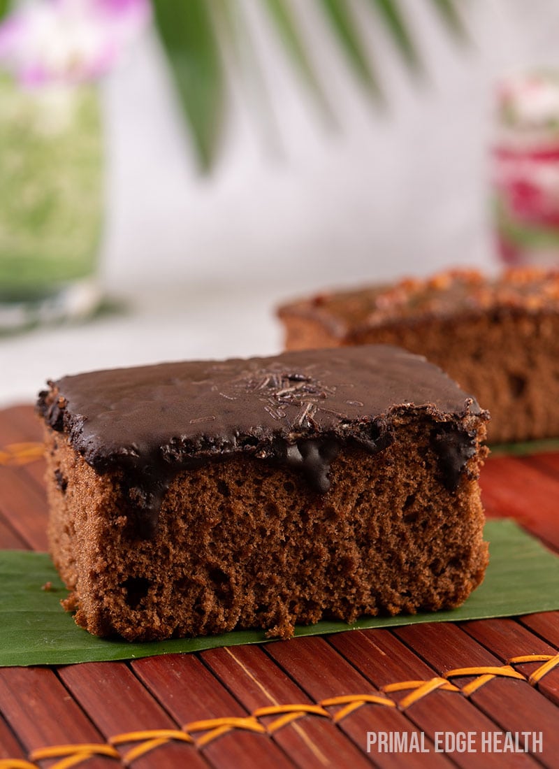 Easy keto chocolate cake on a brown surface.