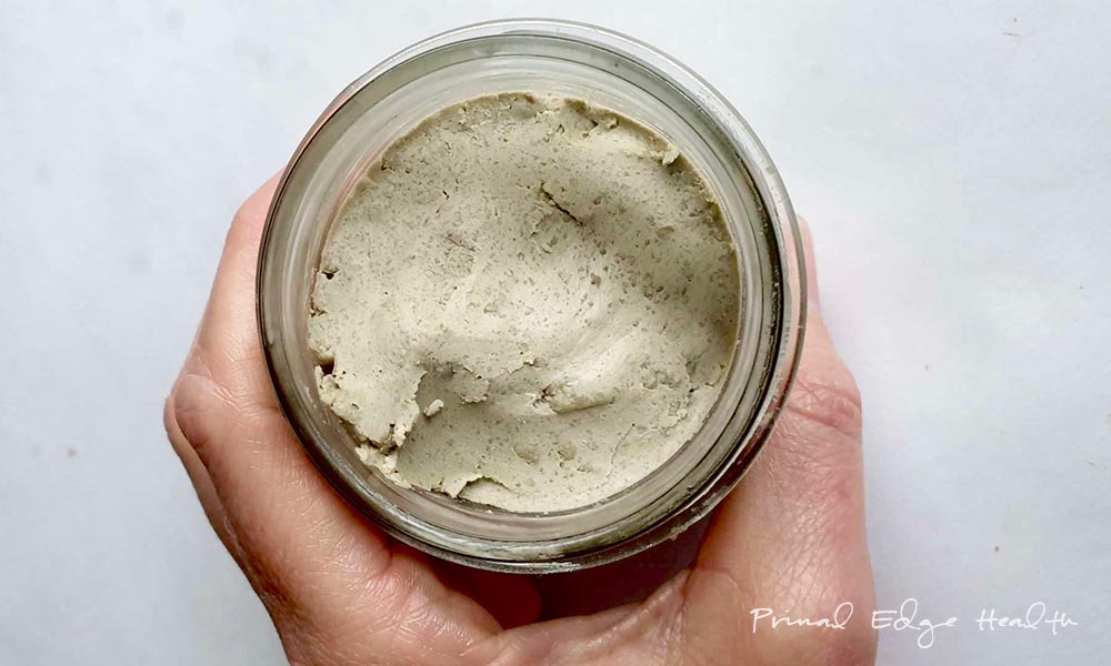 Bentonite clay toothpaste in a jar.