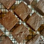 Flourless keto brownies in a cooling rack.