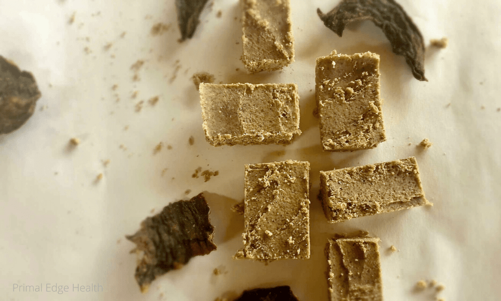 Keto Carnivore Pemmican pieces on a white surface.