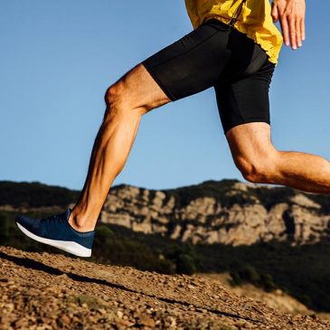 A man jogging on a mountain.