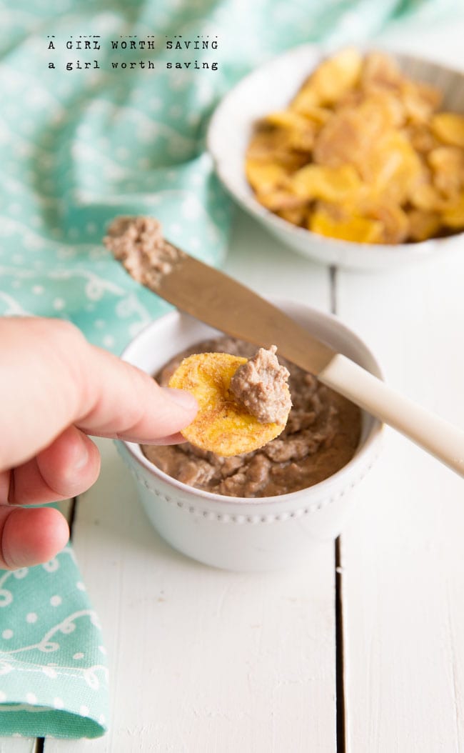 A person is dipping a spoon into a bowl of easy liver Pate.