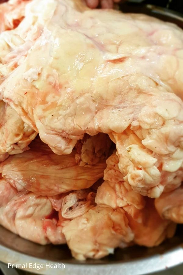 Raw meat in a container.