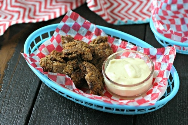 A serving of healthy chicken liver recipe on a wooden board.