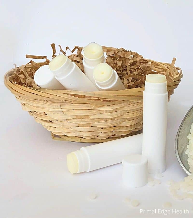 Tallow lip balms in a wicker basket.