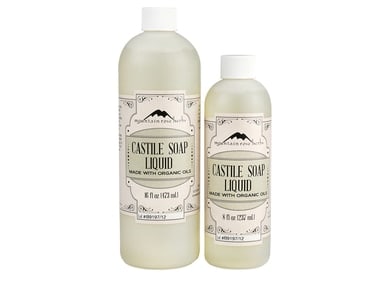 Two bottles of cattle soap.