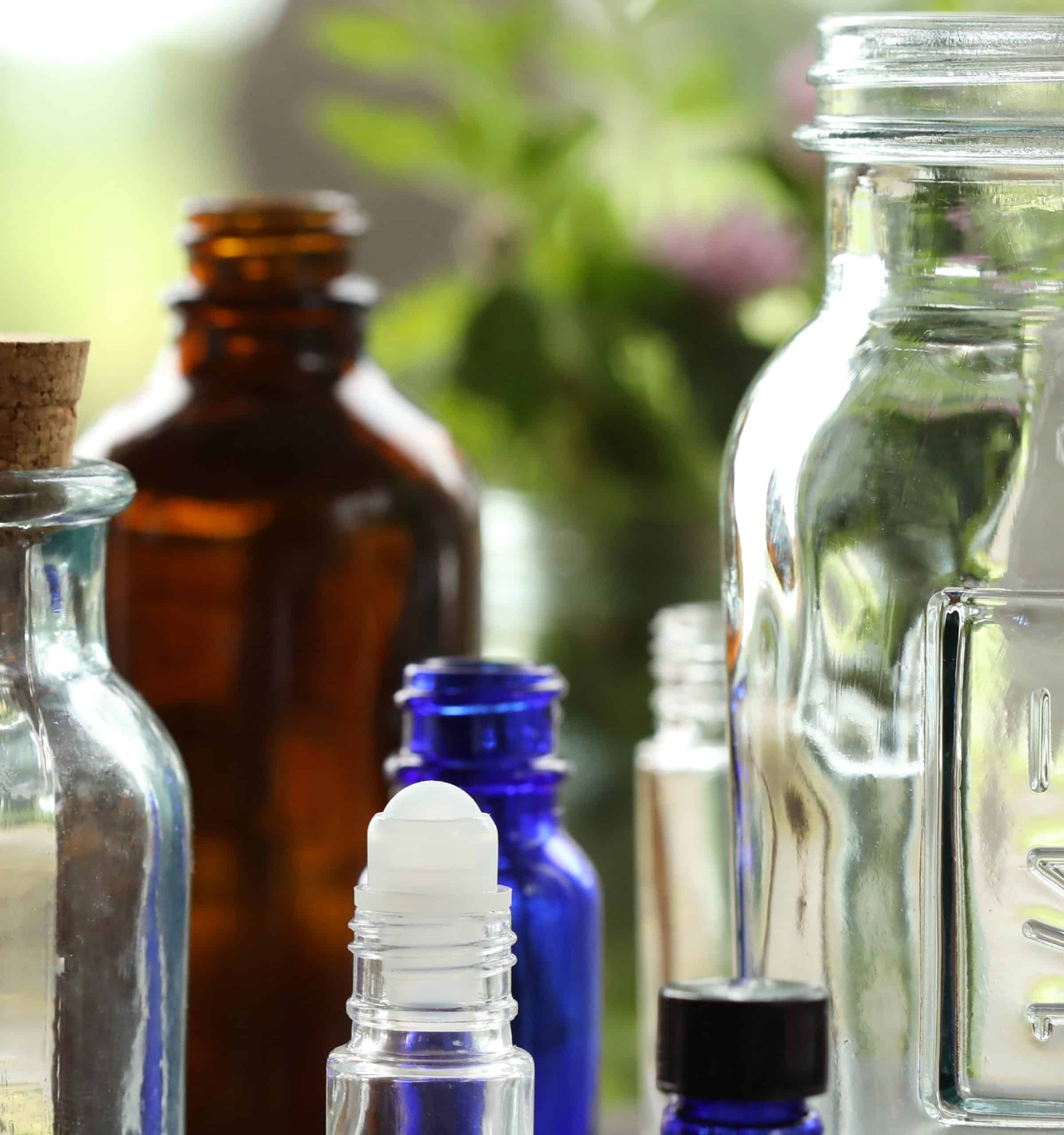 Glass bottles in various shapes and colors.