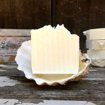 Tallow soaps on a brown surface.