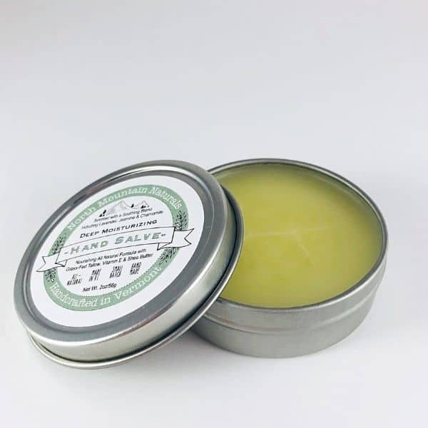 Tallow moisturizer in a small steel container.