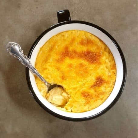 Carnivore custard in a mug with spoon.