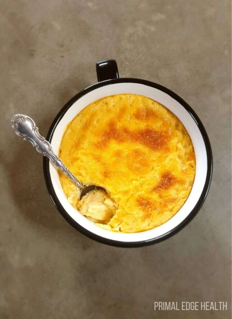 Carnivore custard in a mug with spoon.