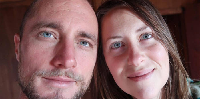 A picture of a man and a woman in a brown background.