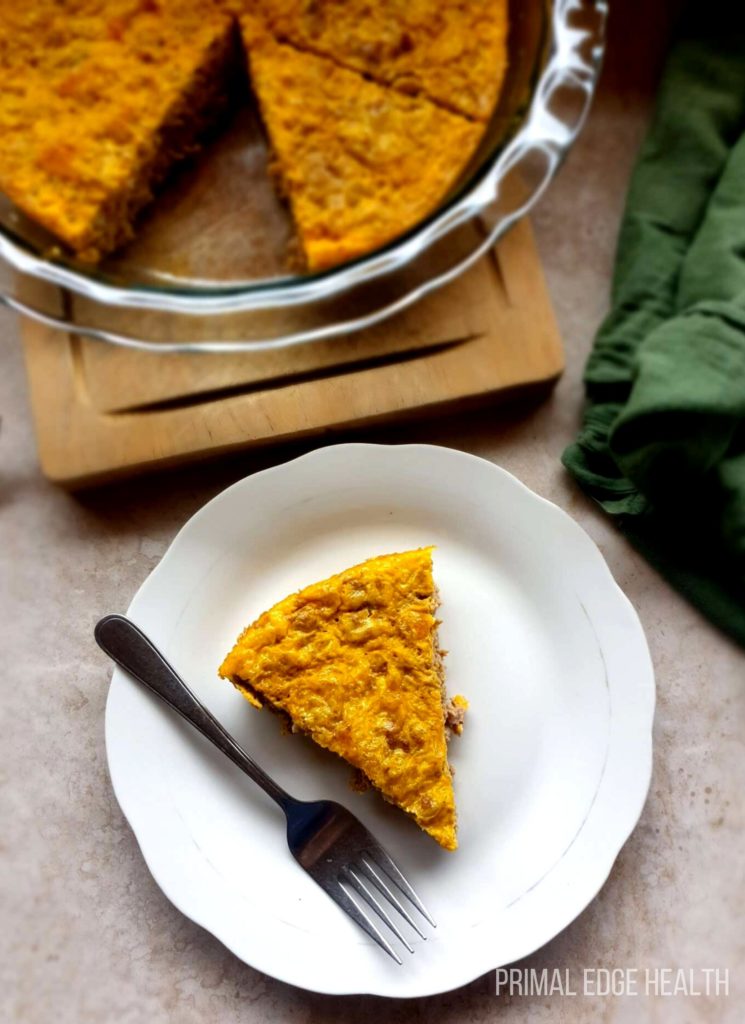 A slice of carnivore casserole on a white plate.