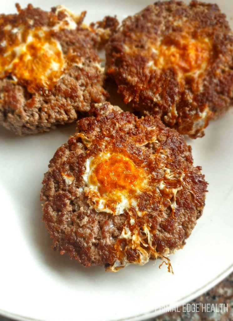 Carnivore egg in a hole on a plate.