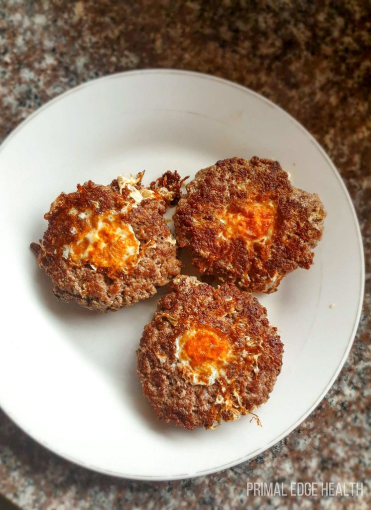 Carnivore egg in a hole on a white plate.