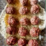 A batch of carnivore meatballs in a glass dish.