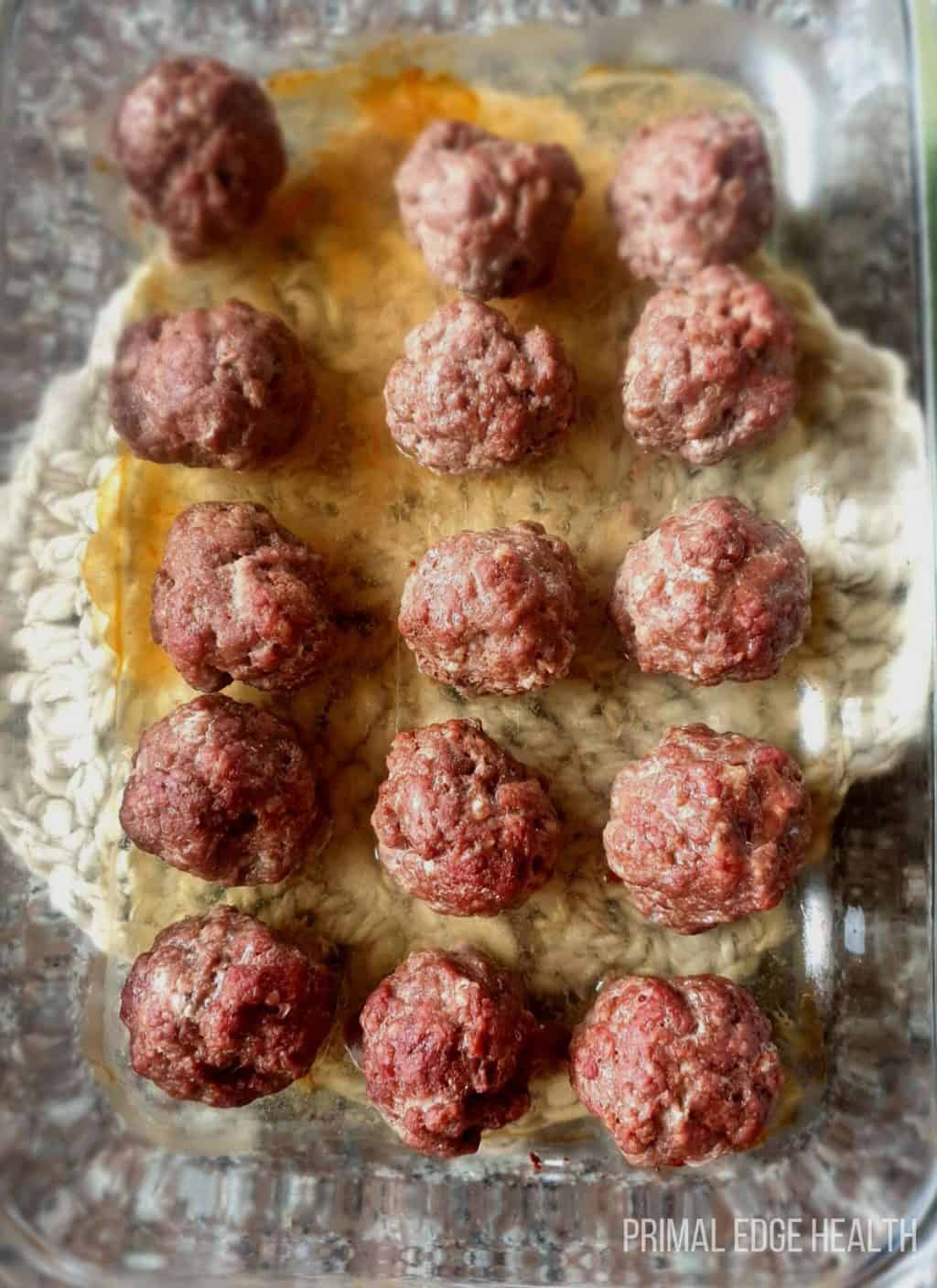 A batch of carnivore meatballs in a glass dish.