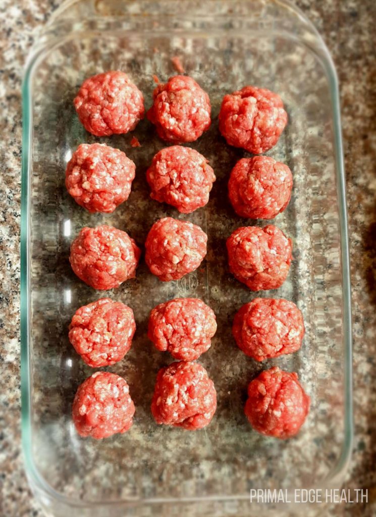 A glass dish containing carnivore meatballs.