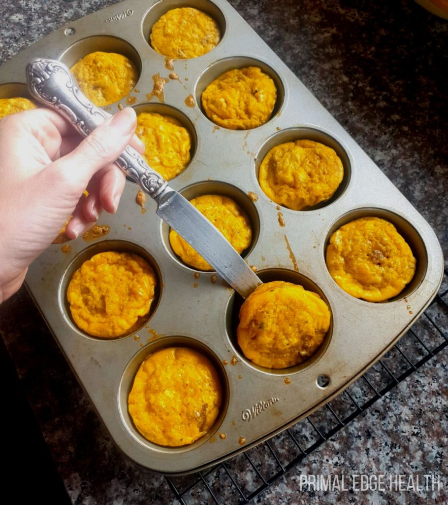 Carnivore muffins being prepped in a baking tray.
